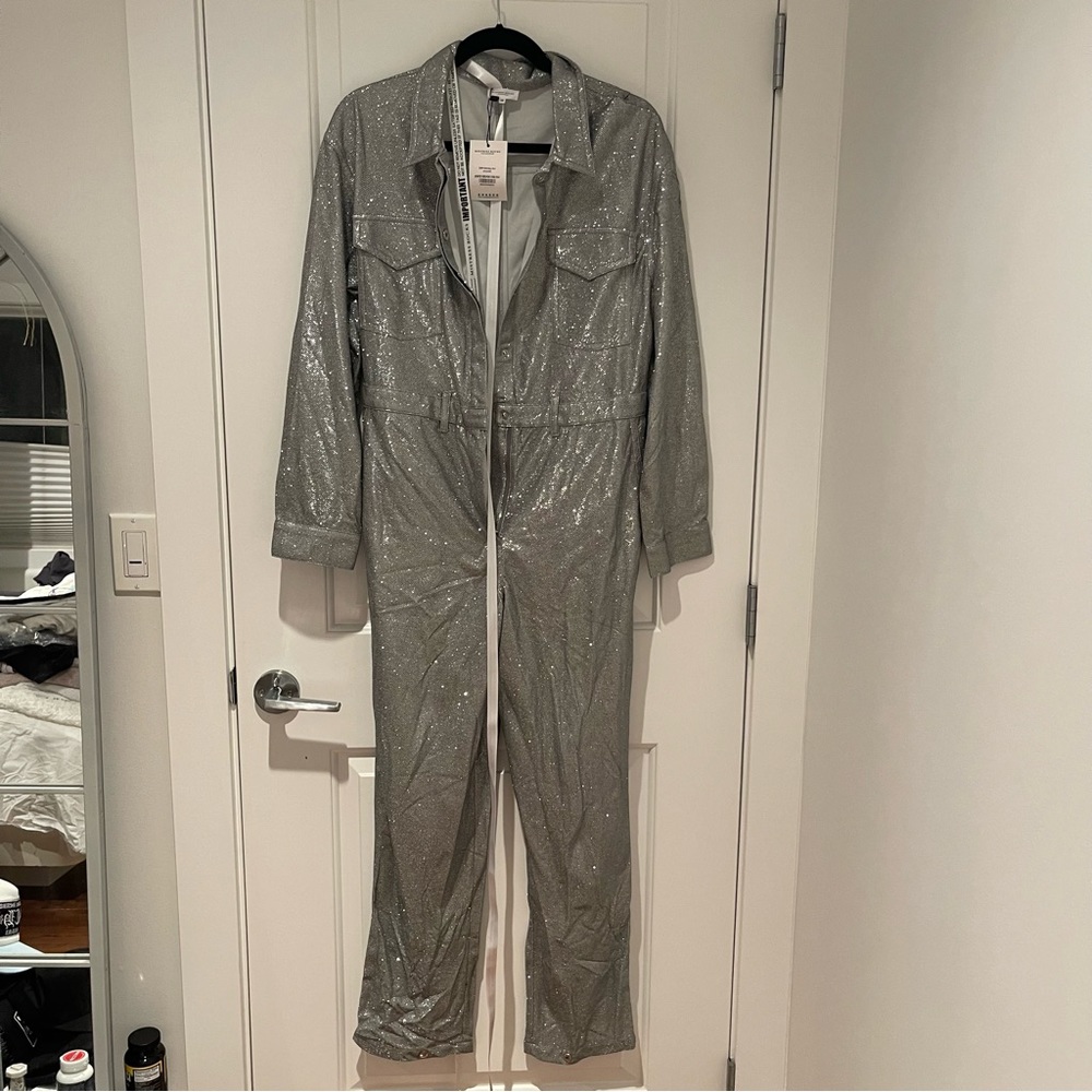 MISTRESS ROCKS 'HEY GIRL'
Silver Sparkle Boiler Suit